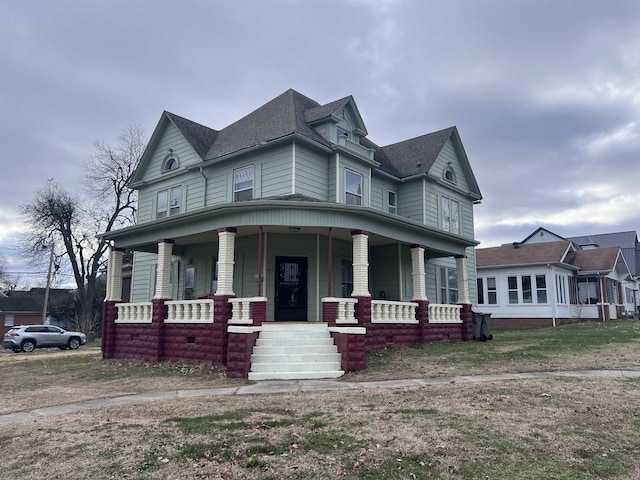 view of front facade featuring covered porch