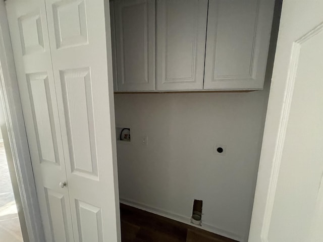 laundry area featuring hookup for an electric dryer, cabinets, washer hookup, and dark hardwood / wood-style flooring