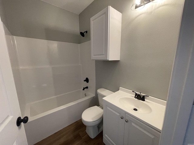135 Mayhaw Ln, El Dorado, AR 71730 - bathroom with bathtub / shower combination, toilet, wood finished floors, and vanity