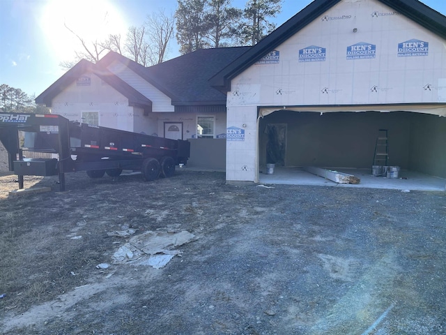 view of front of property with a garage