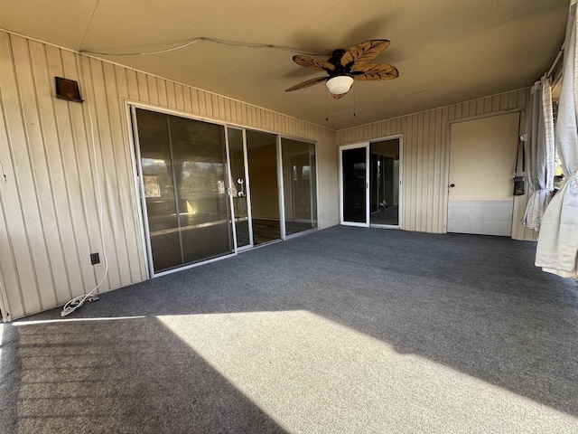 view of patio / terrace featuring ceiling fan