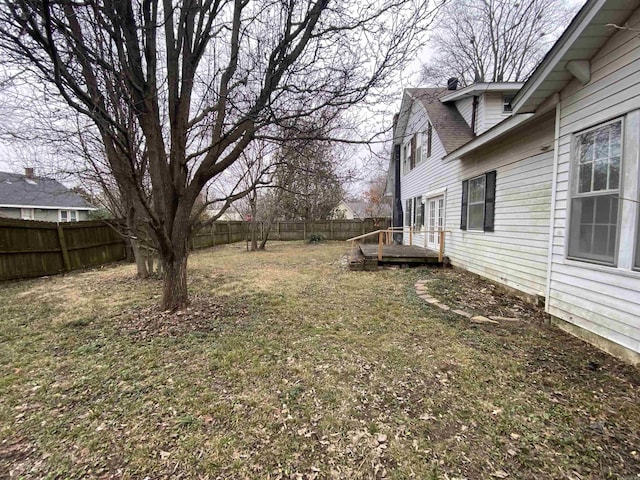 view of yard with a wooden deck