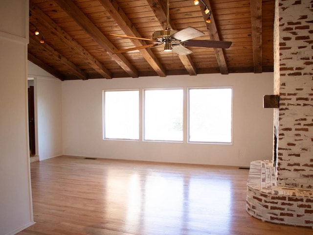 unfurnished living room with light wood-type flooring, vaulted ceiling with beams, ceiling fan, and wood ceiling