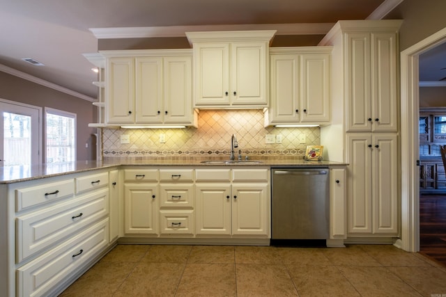 kitchen with dishwasher, sink, tasteful backsplash, light tile patterned floors, and light stone countertops