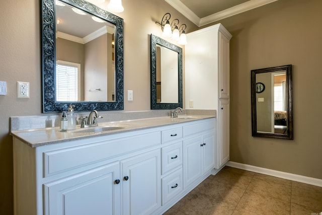 bathroom with tile patterned floors, vanity, and ornamental molding