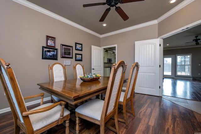 dining space featuring crown molding, dark hardwood / wood-style floors, and ceiling fan