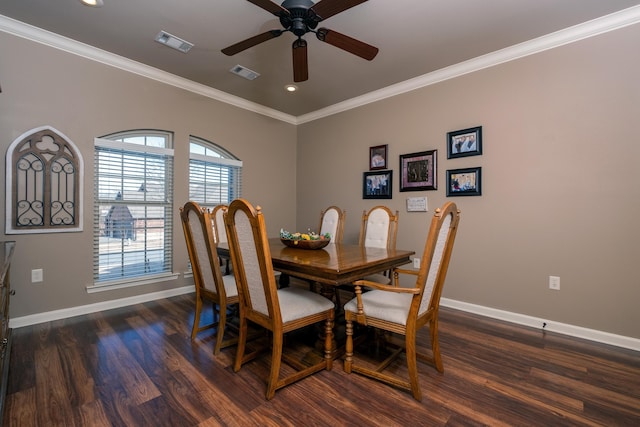 dining space featuring ceiling fan, crown molding, and dark hardwood / wood-style floors