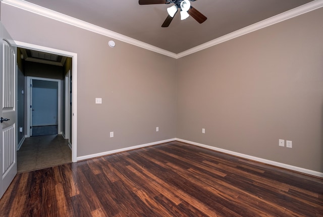 unfurnished room featuring ceiling fan, dark hardwood / wood-style floors, and crown molding