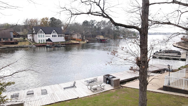 dock area with a water view