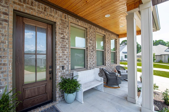 doorway to property with a porch