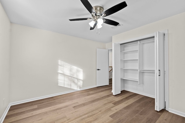 unfurnished bedroom with a closet, ceiling fan, and light hardwood / wood-style floors