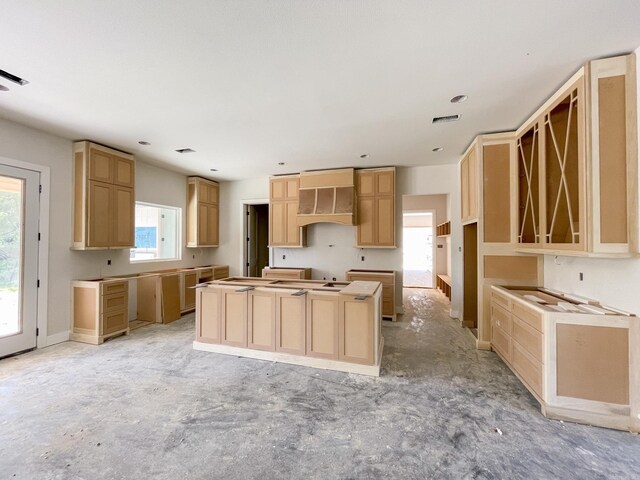 19100 Waterview Meadow Ln, Roland, AR 72135 - kitchen featuring a kitchen island, custom exhaust hood, and light brown cabinetry