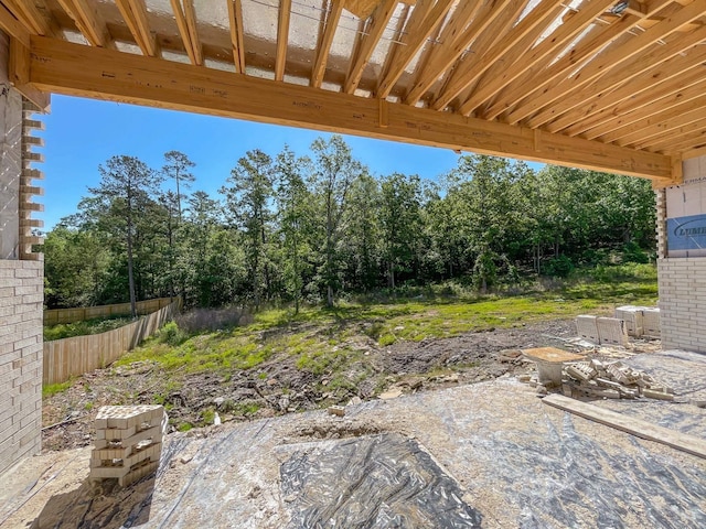 19100 Waterview Meadow Ln, Roland, AR 72135 - view of patio / terrace featuring fence and view of wooded area