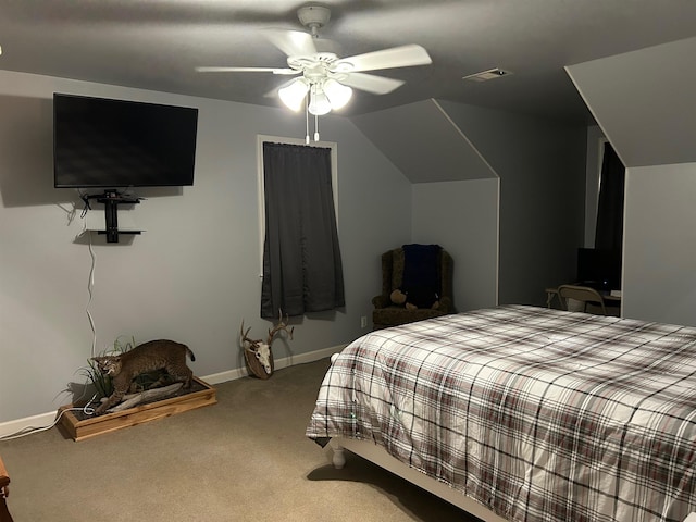 bedroom with ceiling fan, carpet floors, and lofted ceiling