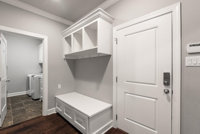 mudroom with washing machine and clothes dryer, ornamental molding, and dark hardwood / wood-style flooring