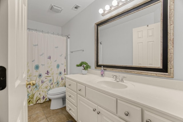 bathroom featuring tile patterned floors, toilet, vanity, and a shower with curtain