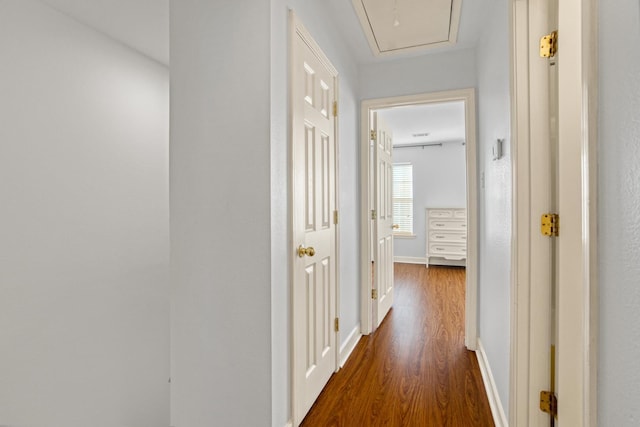 hall with dark hardwood / wood-style floors