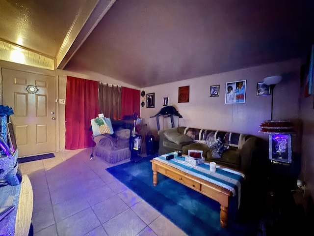 tiled living room featuring beam ceiling