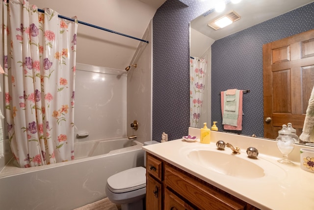 full bathroom with vanity, toilet, and shower / bath combo with shower curtain