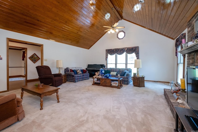 carpeted living room with ceiling fan and high vaulted ceiling