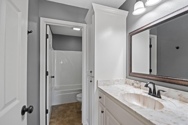 full bathroom with  shower combination, toilet, tile patterned flooring, and vanity