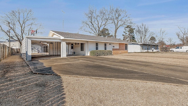 view of front of house featuring a carport