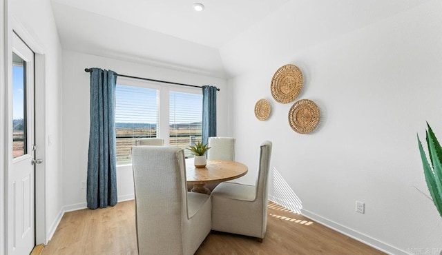 dining room with light hardwood / wood-style flooring