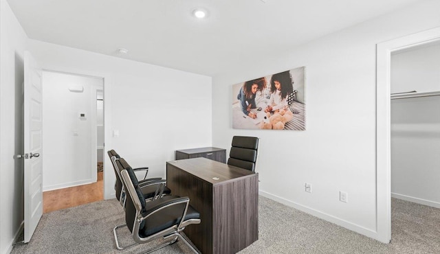 office space with light colored carpet