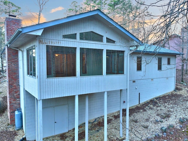 view of property exterior at dusk