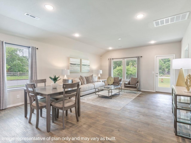 dining room with recessed lighting, visible vents, and wood finished floors