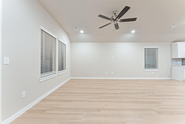 empty room with recessed lighting, baseboards, light wood-type flooring, and ceiling fan