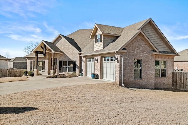 craftsman inspired home with a garage