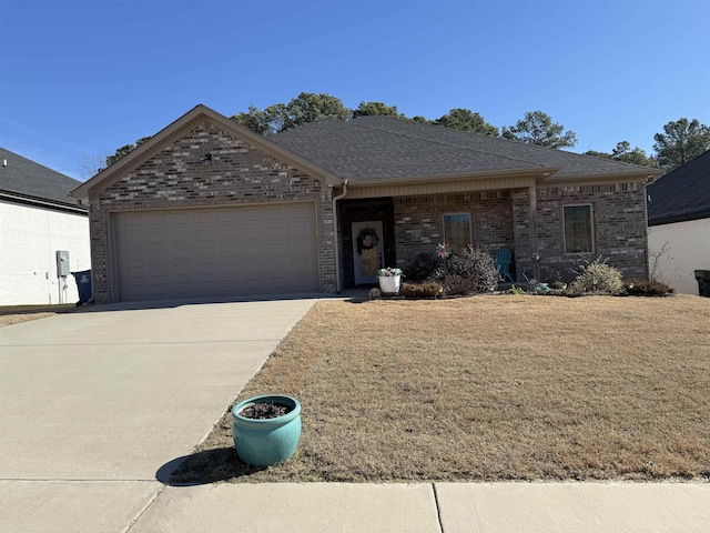 single story home featuring a front yard and a garage