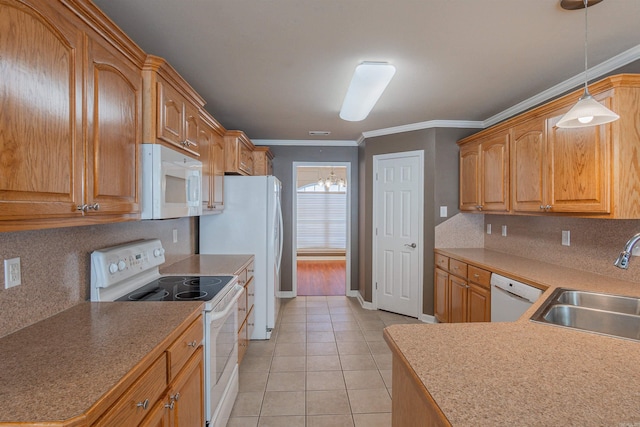 kitchen with sink, white appliances, light tile patterned floors, and crown molding