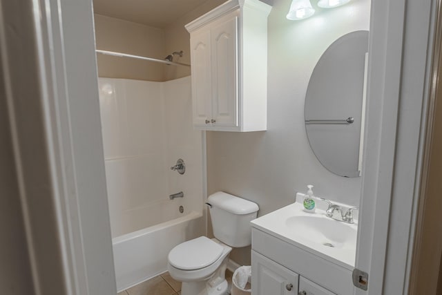 full bathroom with shower / tub combination, toilet, vanity, and tile patterned flooring