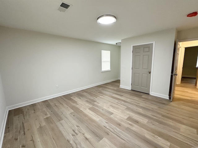 unfurnished bedroom with light hardwood / wood-style flooring