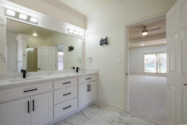 bathroom featuring vanity, ceiling fan, and ornamental molding