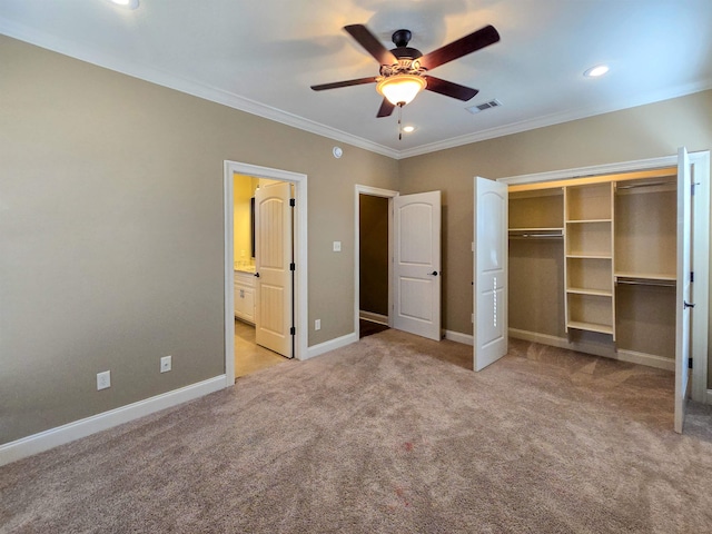 unfurnished bedroom with ornamental molding, light colored carpet, a closet, and ceiling fan