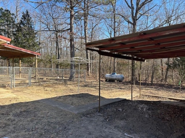 view of yard with a carport