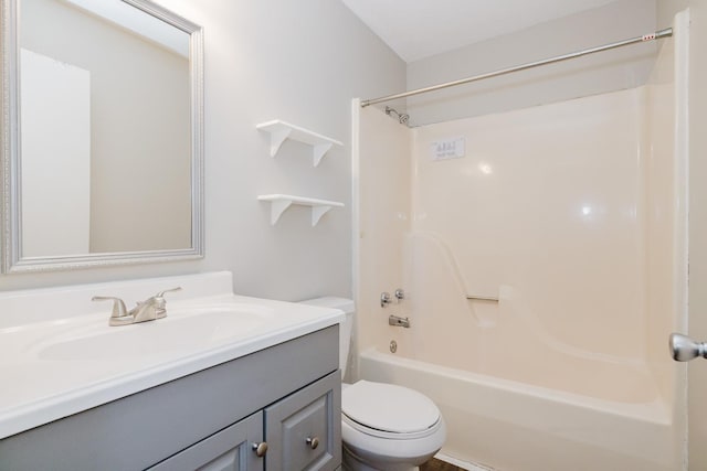 full bathroom with toilet, washtub / shower combination, and vanity