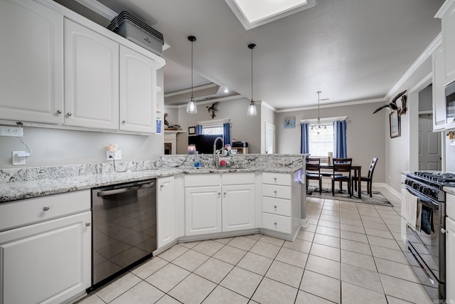 kitchen featuring decorative light fixtures, white cabinetry, black appliances, and kitchen peninsula