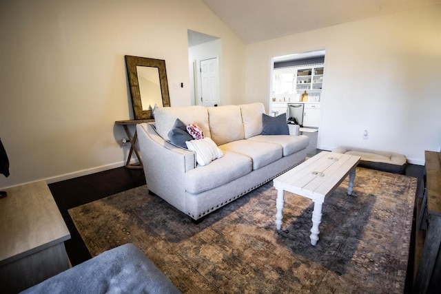 living room with lofted ceiling