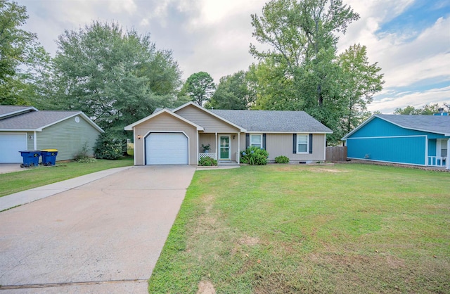 ranch-style home featuring a front yard and a garage