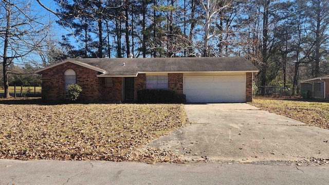 single story home with a garage