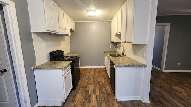 kitchen featuring black appliances, white cabinets, dark hardwood / wood-style floors, and sink