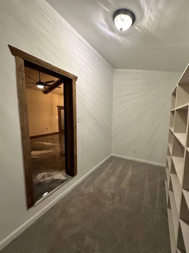 carpeted spare room featuring a textured ceiling