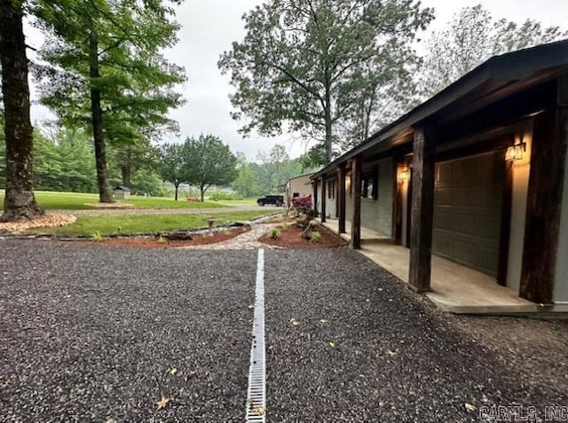 view of yard with a garage