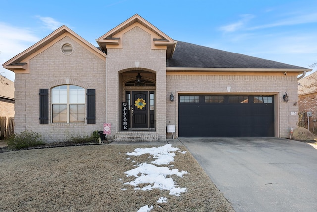 view of front of home with a garage