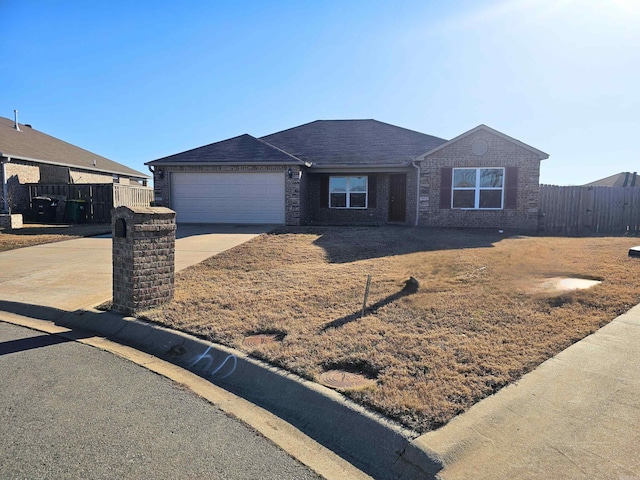 ranch-style home with a garage