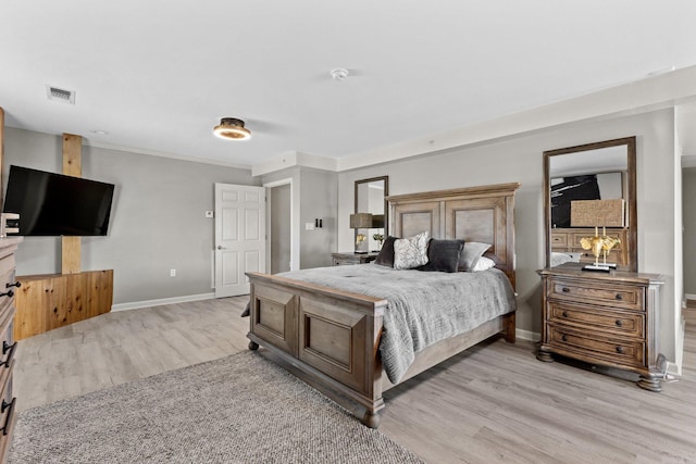 bedroom with light hardwood / wood-style flooring